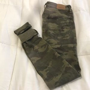 Distressed camo jeans